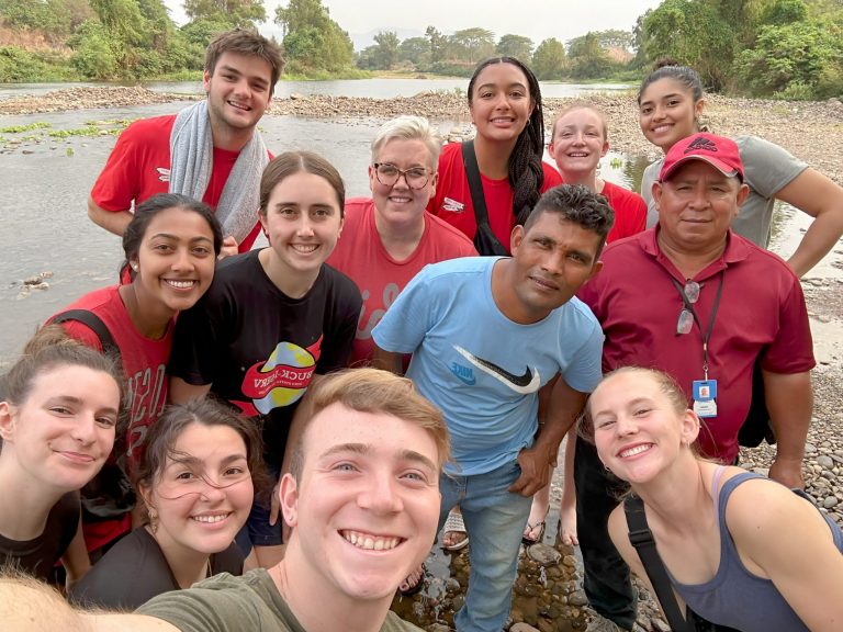 An Ohio State University mission trip team gathers with MdL staff at the HIV children's home in Honduras
